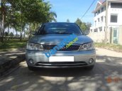 Xe Ford Laser  2004