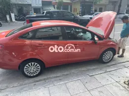 Ford Fiesta 2011 màu cam đỏ đã lăn bánh