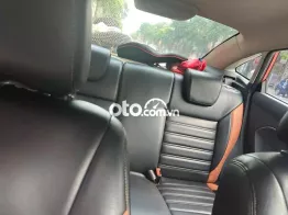 Ford Fiesta 2011 màu cam đỏ đã lăn bánh