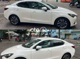 Mazda 2 2015 Trắng 100.000 km