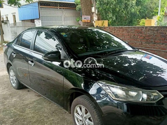 Cần bán lại xe Toyota Vios đời 2016, màu đen