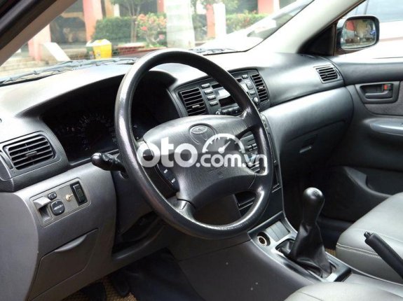 Bán Toyota Corolla Altis đời 2004, màu đen