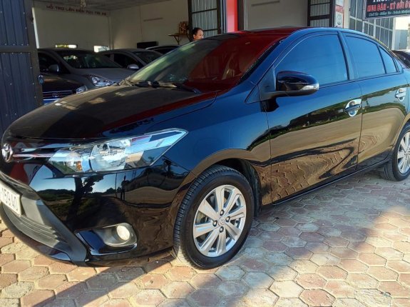 Cần bán gấp Toyota Vios E MT sản xuất năm 2015, màu đen số sàn