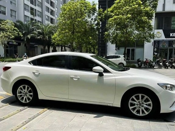 Cần bán lại xe Mazda 6 sản xuất 2015, màu trắng còn mới