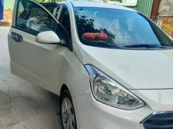 Cần bán lại xe Hyundai Grand i10 AT sản xuất 2019, màu trắng