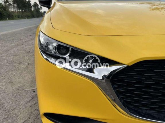 Bán Mazda 3 1.5Hatchback năm sản xuất 2020, màu vàng, 568tr
