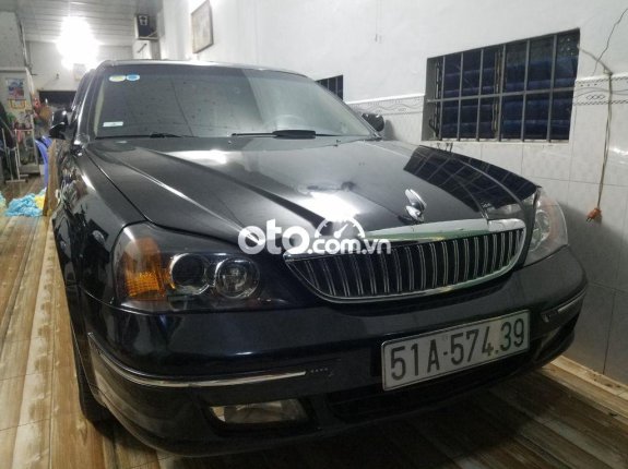 Cần bán xe Daewoo Magnus 2.0 năm 2005, màu đen, nhập khẩu nguyên chiếc, 148tr