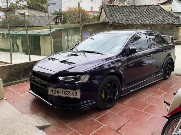 Cần bán lại xe Mitsubishi iO 2.0 Lancer sản xuất 2009, màu tím, xe nhập