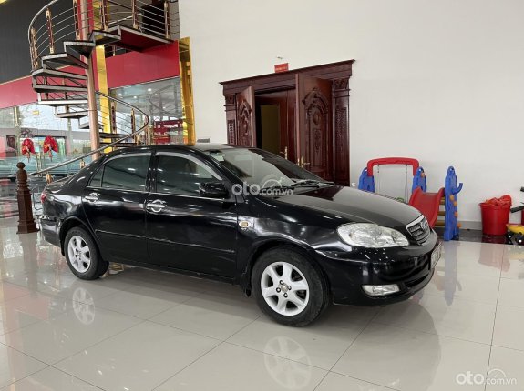 Toyota Corolla Altis 1.8G MT 2004 - Máy số ngon, động cơ lành bền ít hỏng vặt