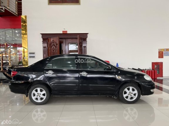 Toyota Corolla Altis 1.8G MT 2004 - Máy số ngon, động cơ lành bền ít hỏng vặt