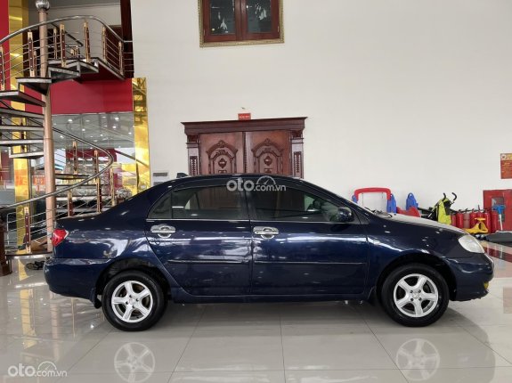 Toyota Corolla Altis 1.8E MT 2002 - Máy số ngon, xe đi lành bền, trang bị nội thất đầy đủ màn android