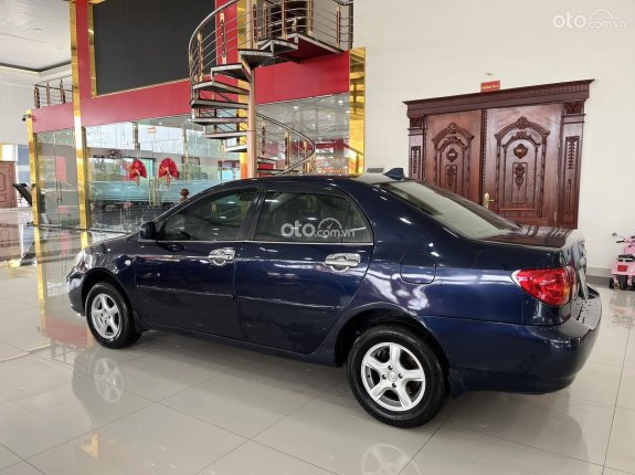 Toyota Corolla Altis 1.8E MT 2002 - Máy số ngon, xe đi lành bền, trang bị nội thất đầy đủ màn android