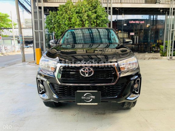 Toyota Hilux 2.4E 4×2 AT 2019 - Xe nhập Thái, máy dầu số tự động, zin nguyên bản, đã lên màn hình Android, nắp thùng