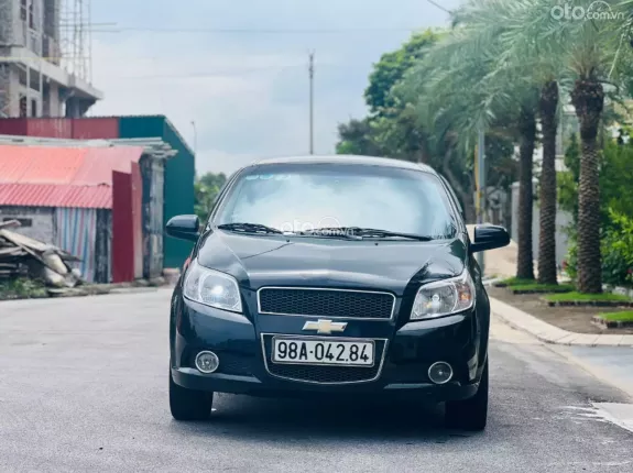 Chevrolet Aveo MT 2014 - Sẵn e xe cỏ cho các anh chị em sử dụng tránh nắng mưa