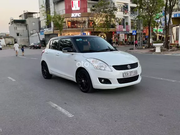 Suzuki Swift 1.4 AT 2014 - Xe số tự động mầu trắng sứ, mầu đẹp nhất của dòng swift tư nhân chính chủ