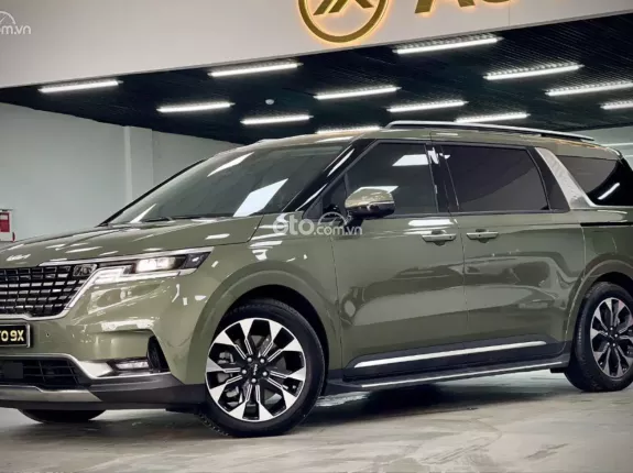Kia Carnival 2.2D Signature 2024 - Màu Xanh Quân Đội - Nội thất nâu