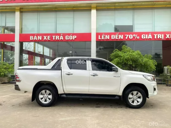 Toyota Hilux 2.4E 4×2 AT 2020 - Bán xe bán tải siêu lướt 1 chủ duy nhất, Zin tuyệt đối