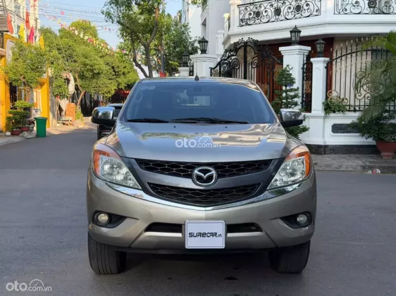 Mazda BT-50 Deluxe 4x2 2.2 AT 2015 - Bán xe bán tải nhập Thái màu vàng đẹp