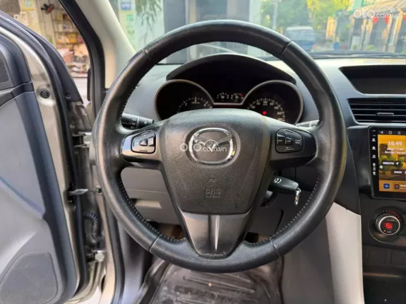 Mazda BT-50 Deluxe 4x2 2.2 AT 2015 - Bán xe bán tải nhập Thái màu vàng đẹp