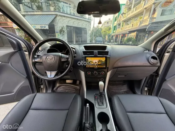 Mazda BT-50 Deluxe 4x2 2.2 AT 2015 - Bán xe bán tải nhập Thái màu vàng đẹp