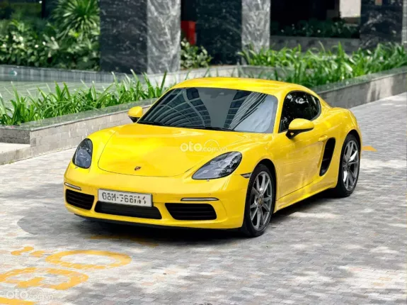 Porsche Cayman 2021 - Xe màu vàng nội thất đen