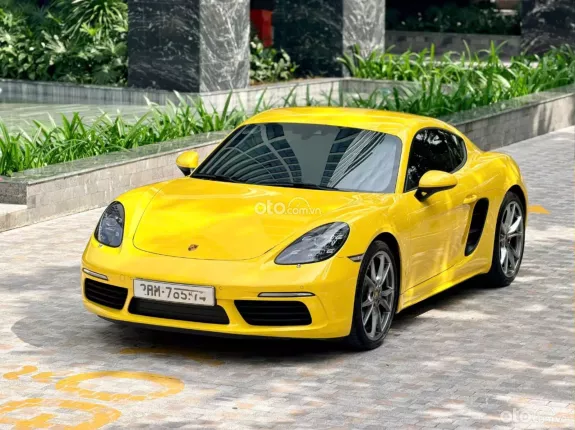 Porsche Cayman 2021 - Xe màu vàng nội thất đen