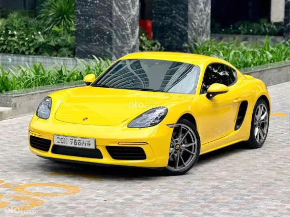 Porsche Cayman 2021 - Xe màu vàng nội thất đen
