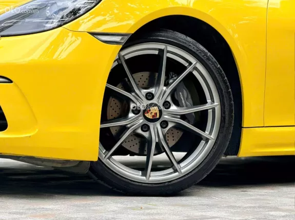Porsche Cayman 2021 - Xe màu vàng nội thất đen