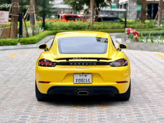 Porsche Cayman 2021 - Xe màu vàng nội thất đen