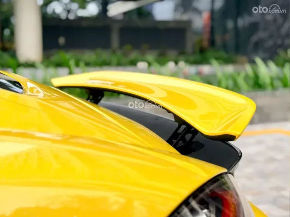 Porsche Cayman 2021 - Xe màu vàng nội thất đen