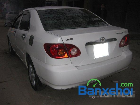 Cần bán Toyota Corolla J sản xuất 2003, màu trắng, giá bán 275Tr