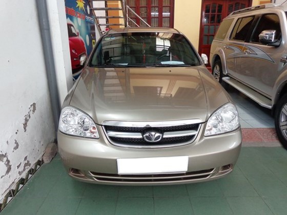 Chính chủ bán xe Daewoo Lacetti EX sản xuất 2010 phom mới, màu cát vàng