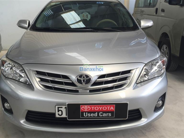 Bán gấp xe Toyota Corolla Altis 1.8G-MT-Dual-VTTi sản xuất 2013, màu bạc