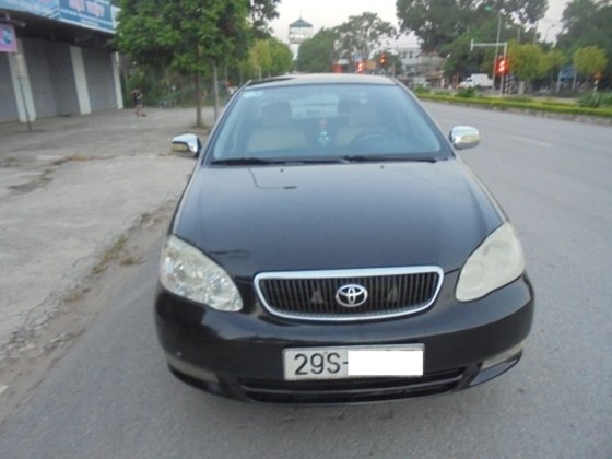 Gia đình cần bán xe Corolla Altis 1.8 số tay 2003 chính chủ mầu đen