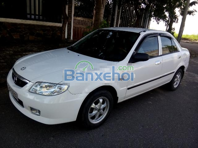 Cần bán lại xe Mazda 323 đời 2003, màu trắng, xe nhập