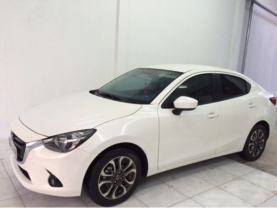 Bán Mazda 2 đời 2015, màu trắng, nhập khẩu, như mới, giá 655tr