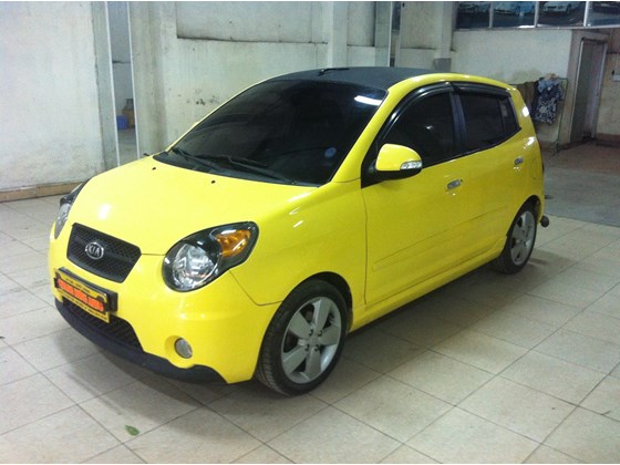 Cần bán lại xe Kia Morning đời 2009, màu vàng, xe nhập, số tự động