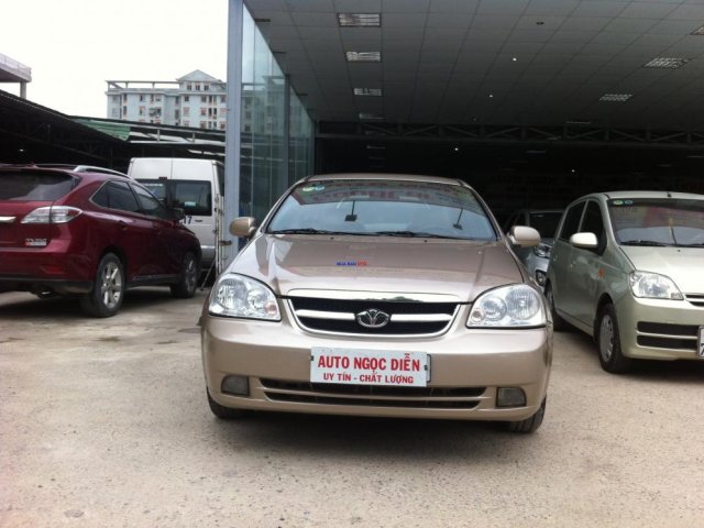 Daewoo Lacetti màu vàng cát, số sàn, máy xăng, SX 2010, đăng ký 2011