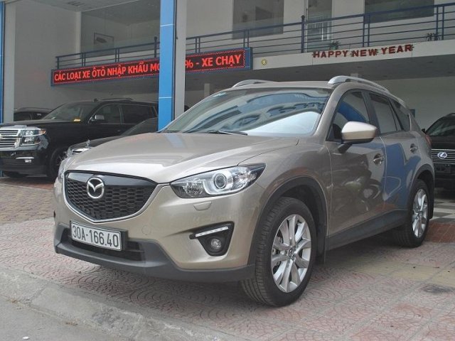 Cần bán lại xe Mazda CX 5 đời 2015, màu vàng cát, chính chủ