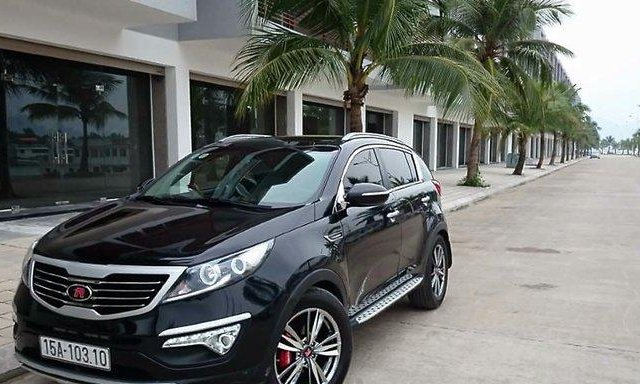 Cần bán gấp Kia Sportage R TLX đời 2010, màu đen