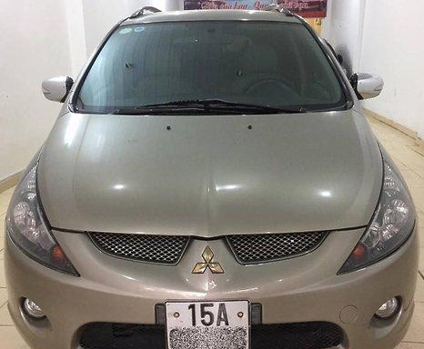 Bán ô tô Mitsubishi Grandis 2.4 Mivec đời 2006, màu vàng số tự động