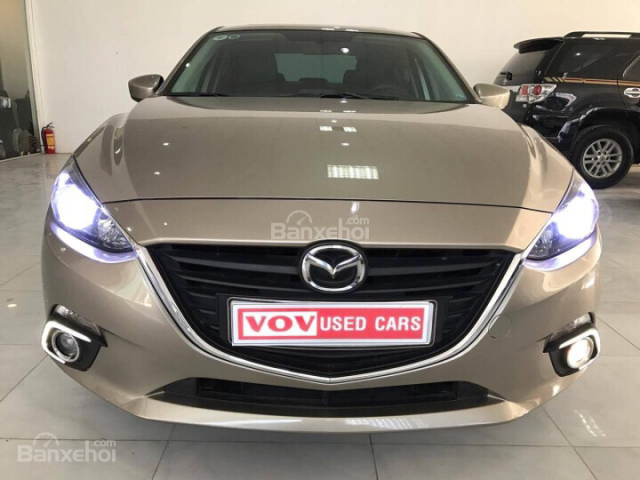 Cần bán lại xe Mazda 3 đời 2015 màu vàng cát, giá chỉ sinh viên