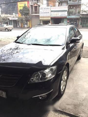 Bán xe cũ Toyota Camry 2.4 đời 2009, màu đen, giá chỉ 700 triệu