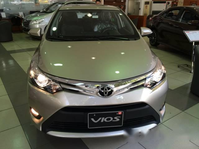 Bán xe Toyota Vios 1.5E đời 2016, màu nâu vàng