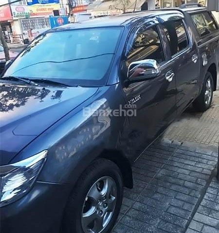 Cần bán gấp Toyota Hilux E đời 2012, màu xám, xe nhập chính chủ