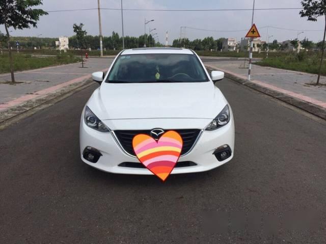 Gia đình bán xe Mazda 3 đời 2015, màu trắng như mới, giá chỉ 660 triệu