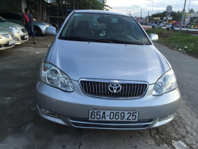 Bán xe cũ Toyota Corolla altis 1.3 năm 2003, màu bạc xe gia đình, 250 triệu