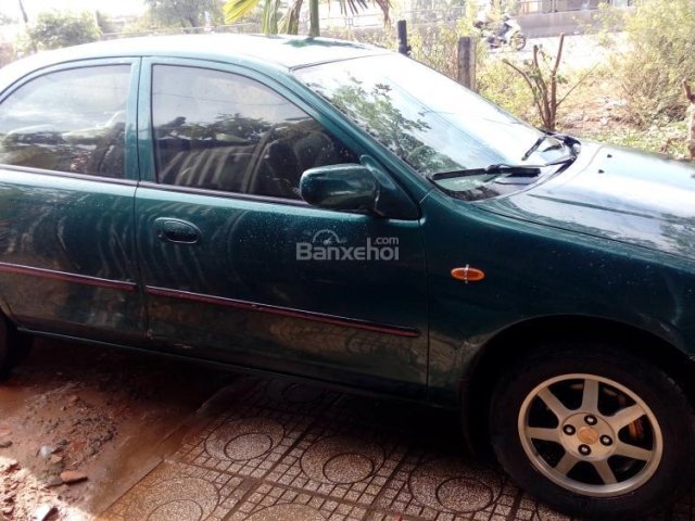 Cần bán gấp Mazda 323 đời 1999, màu xanh lam, nhập khẩu chính chủ, giá 145tr