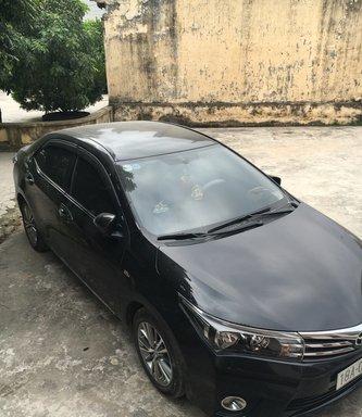 Xe Toyota Corolla altis đời 2015, màu đen số sàn 