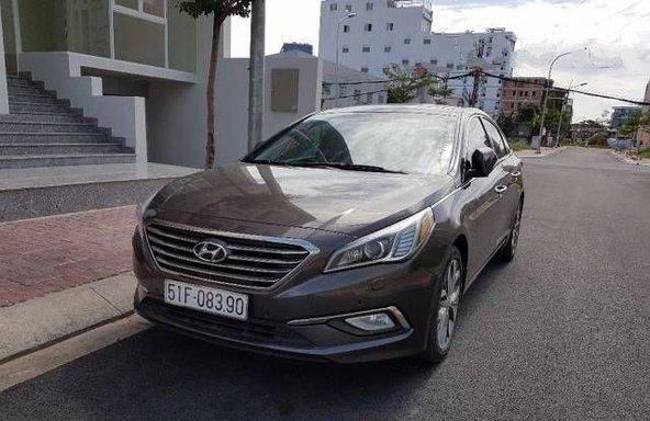 Gia đình bán Hyundai Sonata MT đời 2014, màu nâu, nhập khẩu nguyên chiếc